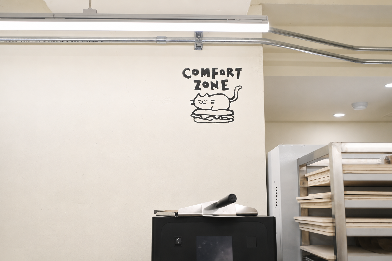 COMFORT ZONE sandwich café seating and exposed conduit